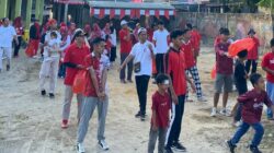 Sambil Pungut Sampah, Warga LDII Desa Tarjun Kobarkan  Semangat HUT Ke – 81 RI lewat Jalan Sehat dan Senam Kebangsaan